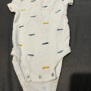 White Carter’s Baby Onesie with Car Print